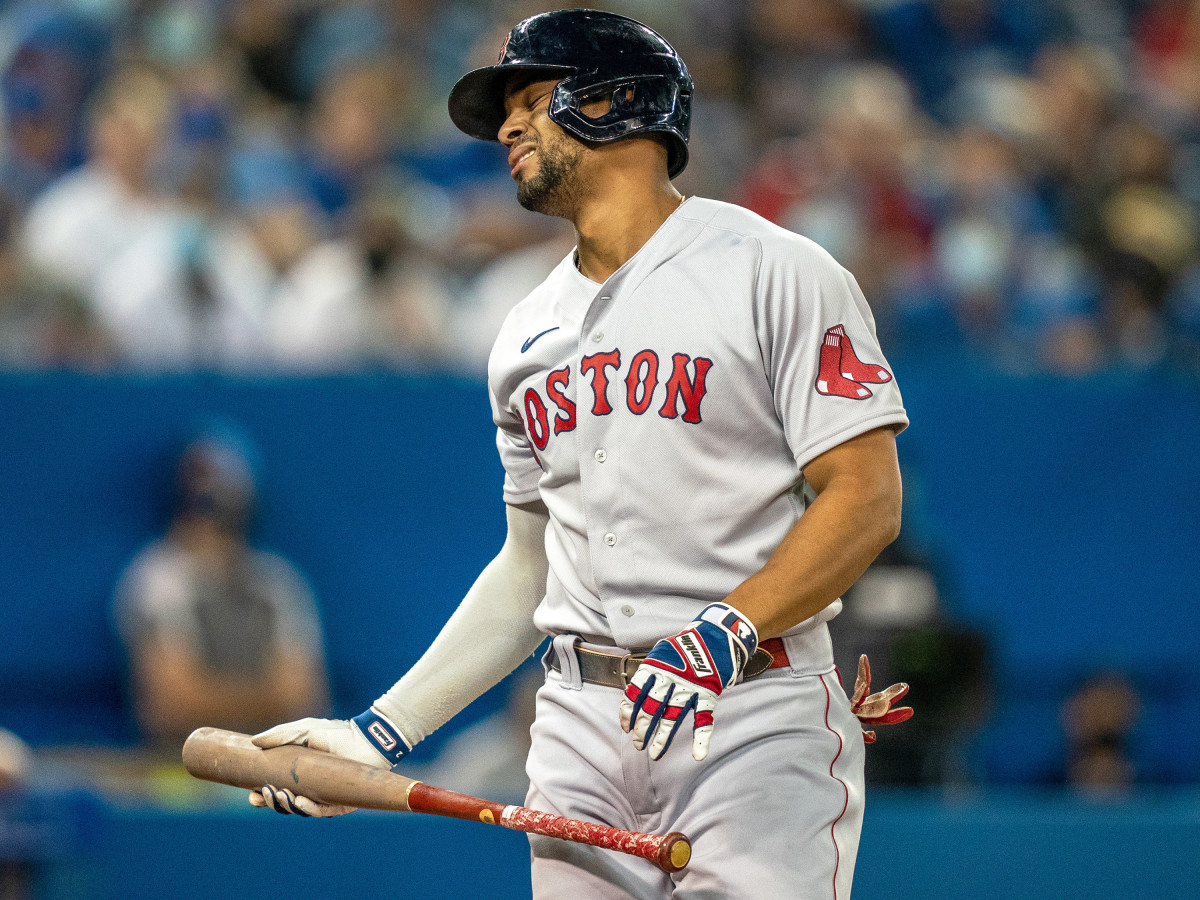 Aug 7, 2021; Toronto, Ontario, CAN; Boston Red Sox shortstop Xander Bogaerts (2) reacts after taking a strike against the Toronto Blue Jays during the first inning at Rogers Centre.